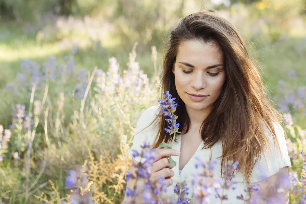 Woman lost in thought while reflecting on anxious thoughts and overthinking