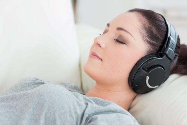 woman relaxing listening to stop drinking alcohol hypnosis recording